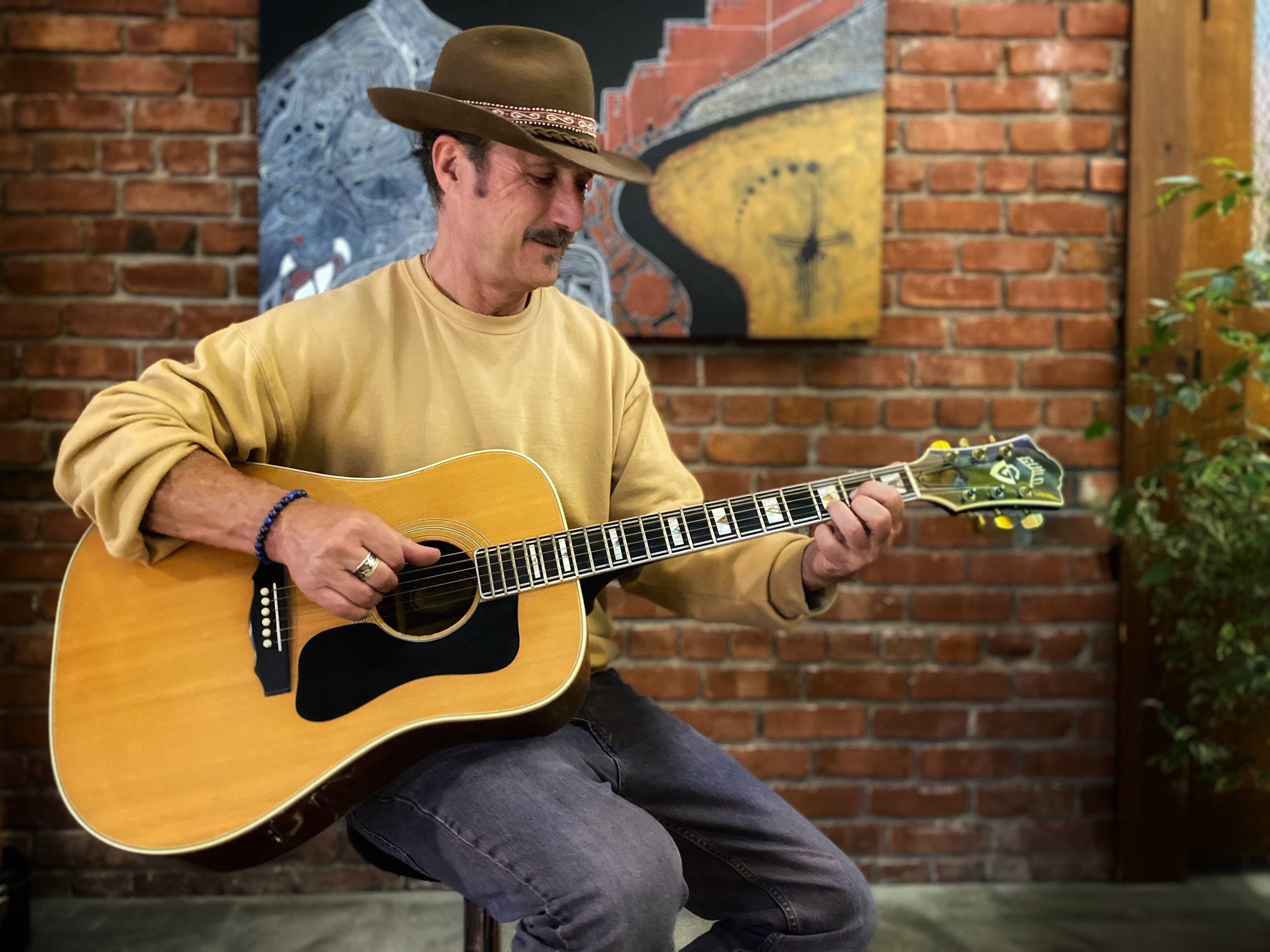 Ricco with hir guitar